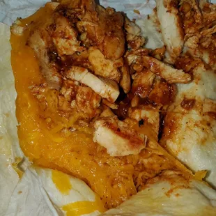 What is this? What happened the chicken burrito looks like Chinese food in a cheap tortilla!