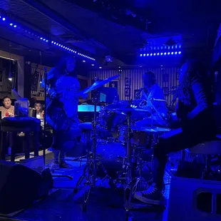a band playing on stage
