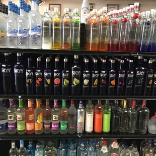 a shelf full of bottles