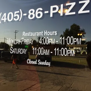 The Hours are posted on the window!