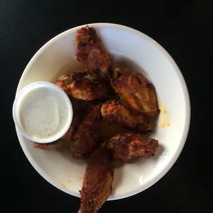 Chicken wings well done. Done well.