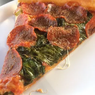 Light cheese, spinach, pepperoni, garlic salt on thin crust. This pizza needs a name.