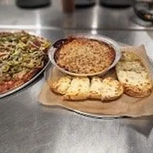 Felix pizza on the left.