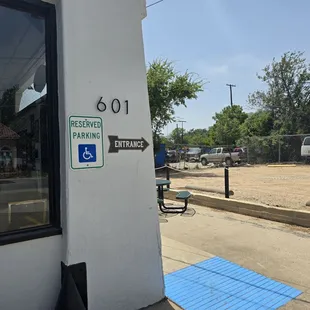 Front side of building for handicap parking spaces eight next to front door.