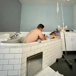 The awesome birthing tub at her birth center. Plenty of room for the hubs too.