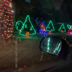 Cute Christmas tree lot light display, just one of the many light displays/scenes!