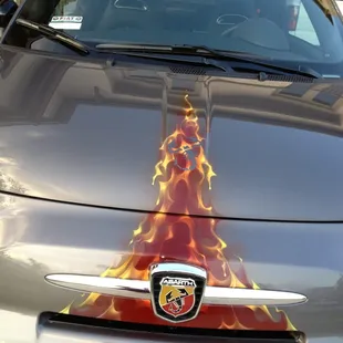 Flames with ghost scorpion on hood.