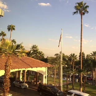 cars parked in front of the hotel