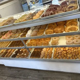 a display of various types of donuts