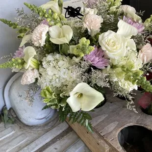 Sympathy bouquet suggested to me with soft pops of color. What a great suggestion.