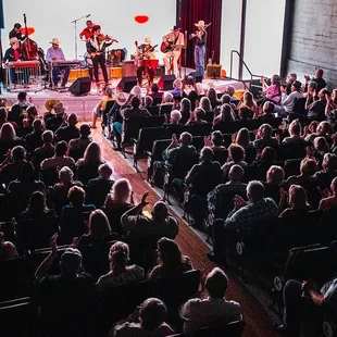 a band performing on stage