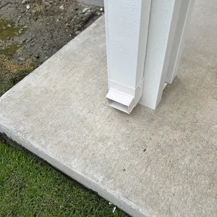 Drains on both sides of the patio cover.