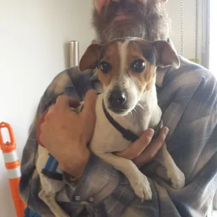 This pup will have a full tummy thanks to pet food donations made by the community.