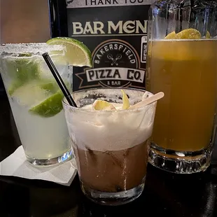 Skinny margarita, whiskey sour with guava, blue moon
