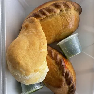 Chicken salteñas and cuñapé