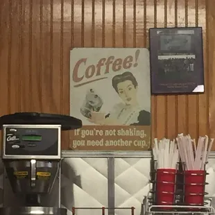 With a smile, it reads- "If you're not shaking, you need another cup."   Leave it to an original 1950's diner to make us "Lol."