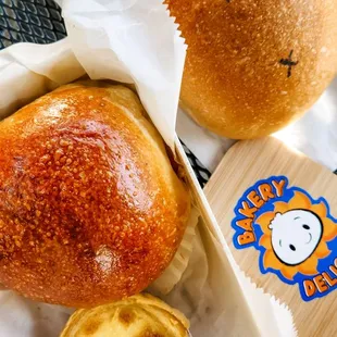 Baked pork bun, egg custard tart, and chocolate filled bunny