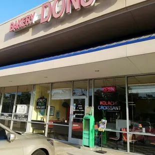 a car parked in front of the store