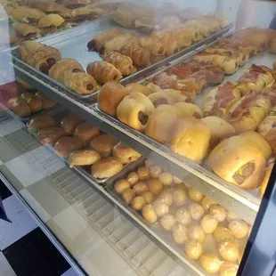 Donut holes, along with bacon, jalapeño, egg, croissant and sausage kolaches!