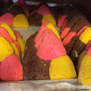 a variety of colorful cakes