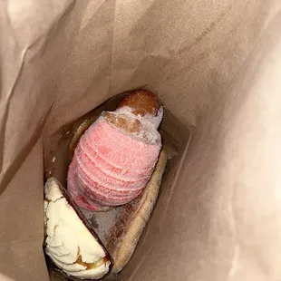 a sandwich in a paper bag