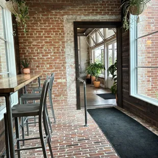 Hallway to larger indoor seating area