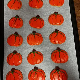 pumpkin cookies on a baking sheet