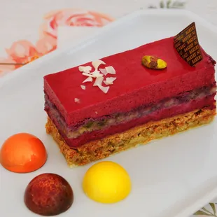 Pistachio cassis layered mousse cake