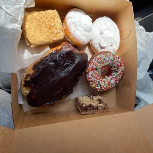 a variety of donuts in a box