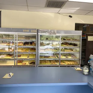 a counter with a variety of baked goods