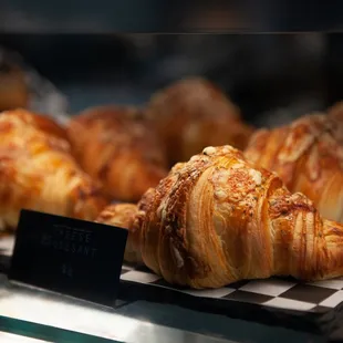 Indulge in our Cheese Croissant, handcrafted with fine French ingredients and filled with imported Comté cheese.