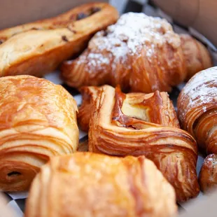 a variety of pastries in a box