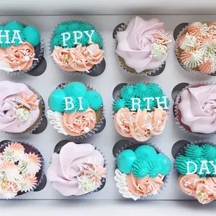 Tiffany Blue Custom Cupcakes (standard size) in "Happy Birthday" design: eclectic piping with "Happy Birthday" fondant letters.