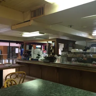 Grab your coffee on the way in, order and pay. This view is from the furthest seat from the door.
