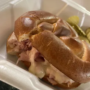 Swiss and hot ham on pretzel buns