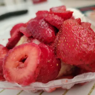 strawberries in a plastic container