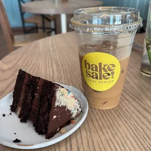 Vegan chocolate cake and two shots of decaf espresso on ice with oat milk