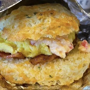 The Charleston - cheddar biscuit, pimento cheese, eggs and bacon.