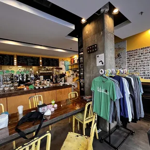 a variety of clothing hanging on a rack