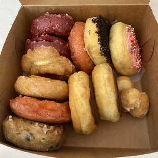 Dozen donuts-  includes a variety like red velvet, Boston cream, buttermilk, strawberry, blueberry and Oreo