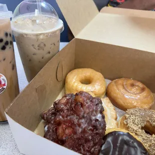 Maple walnut, strawberry fritter, cinnamon roll, sour cream, glaze, vanilla crème donuts  Milk tea boba, iced coffee