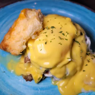 a plate of eggs benedict
