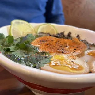 a close up of a bowl of ramen