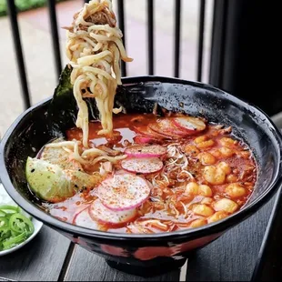 a close up of a bowl of ramen