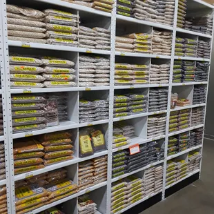 a shelf full of bread rolls