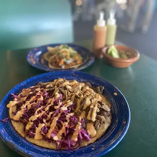 Korean asada quesadilla, al pastor and some kind of other pork taco.
