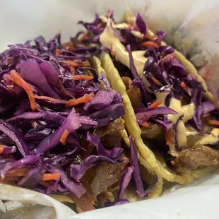 3 tacos, left to right, Korean, carnitas, Coconut Shrimp