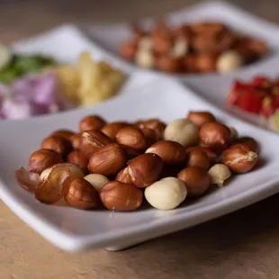 a plate of nuts and vegetables