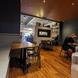 a wooden table and chairs