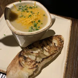 Cheesy potato soup with grilled baguette